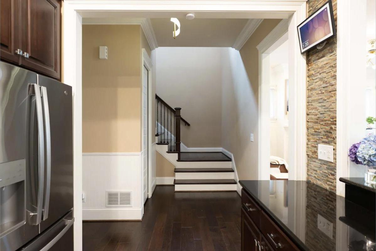 Hallway and staircase connecting the main living level