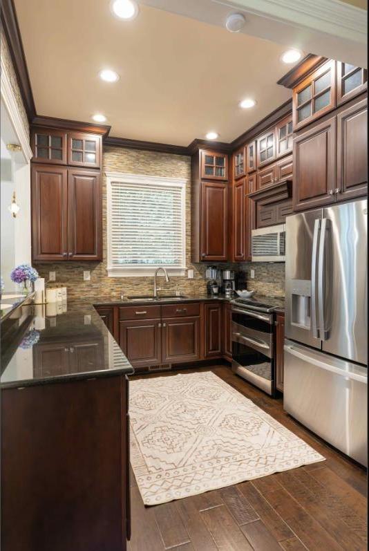 Fully equipped kitchen with granite counters and stainless appliances