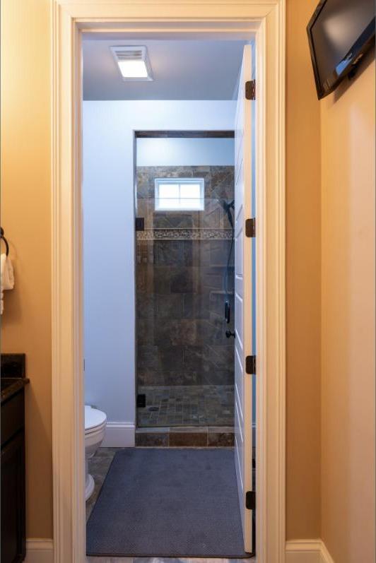 Primary Suite bathroom's main-floor walk-in shower
