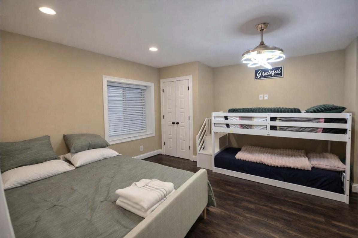 The Retreat Suite with a twin bunk bed and queen daybed