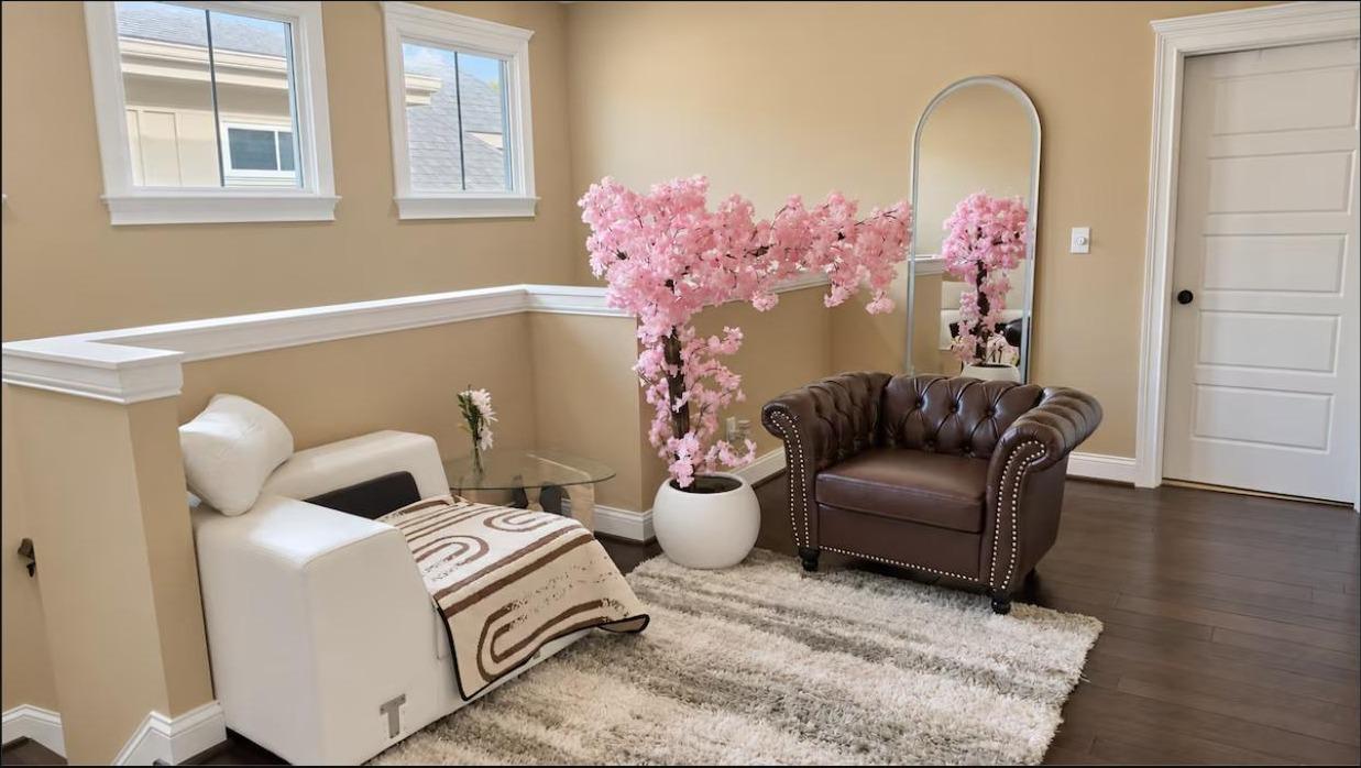 A quiet upstairs sitting nook overlooking the stairwell